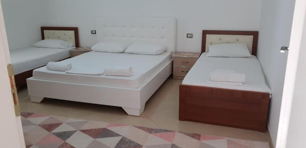 Standard Quadruple room with garden view