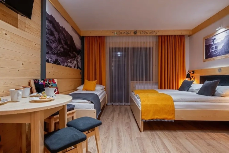 Deluxe Quadruple room with balcony