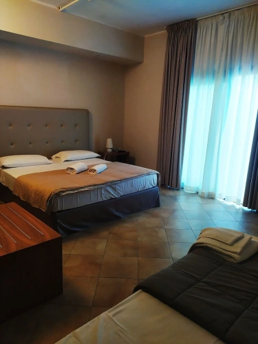 Deluxe Triple room with garden view