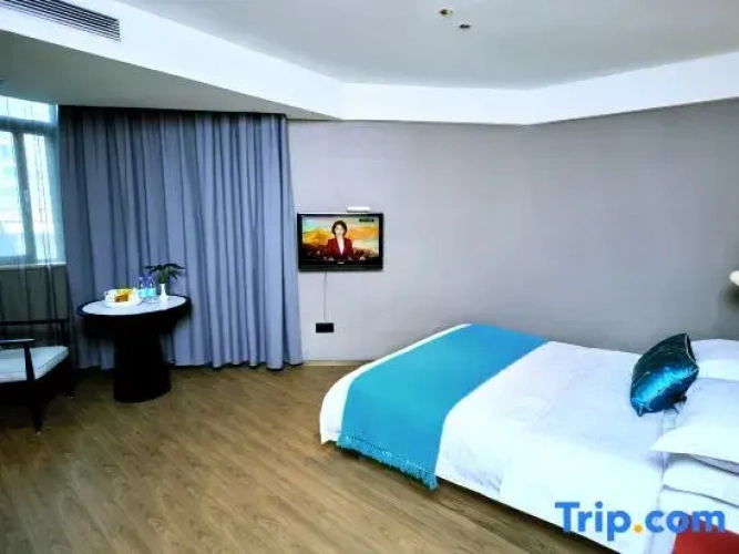 Standard Triple room with garden view