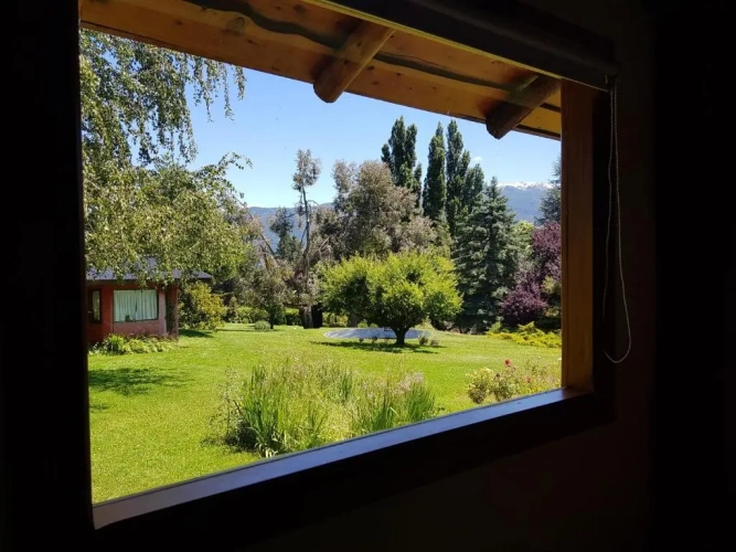 Bungalow with balcony and with garden view
