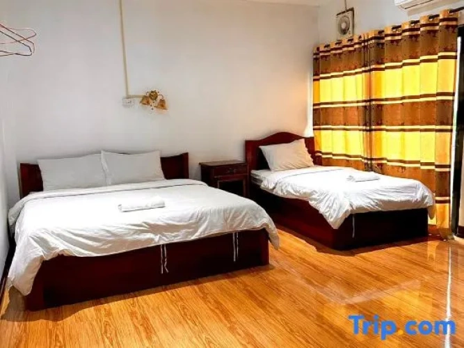 Standard Triple room with garden view