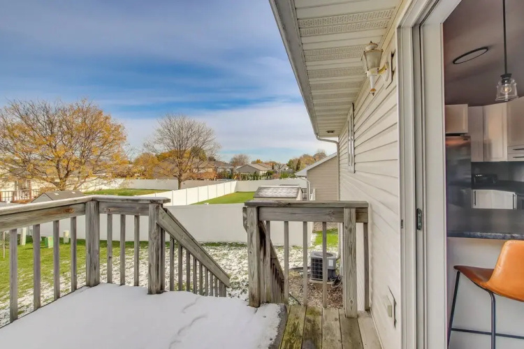 Bright Little Chute Condo w/ Deck & Yard!