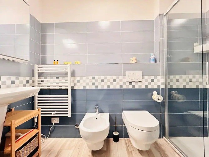 Moderno Bilocale con Terrazzo e Parcheggio