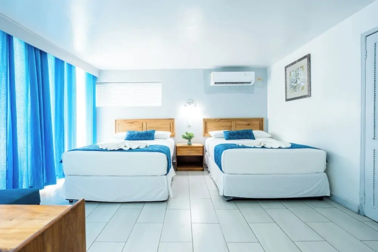 Standard Quadruple room with balcony and with pool view