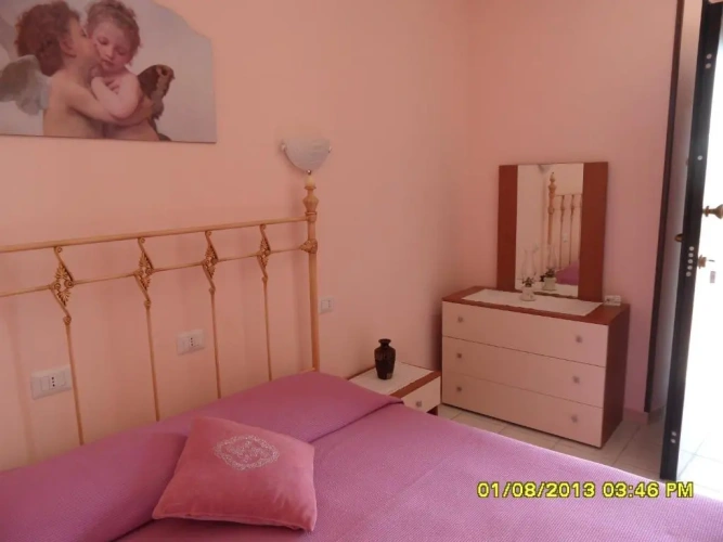 Standard Triple room with garden view