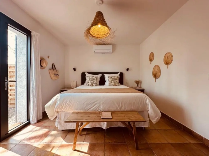 Standard Triple room with garden view