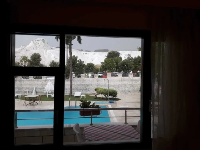 Standard Triple room with balcony and with pool view