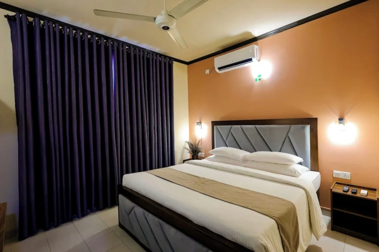 2 Bedrooms Standard Quadruple Family room with garden view