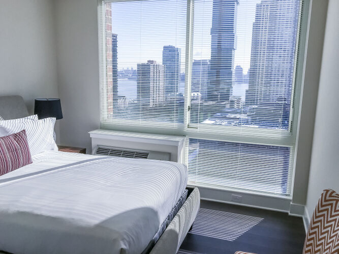 Dharma Home Suites JC at Grove Station IIOver view