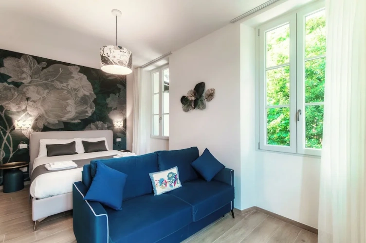 Deluxe Quadruple room with balcony and with lake view