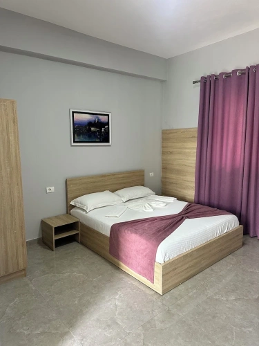 Standard Triple room with balcony and with garden view