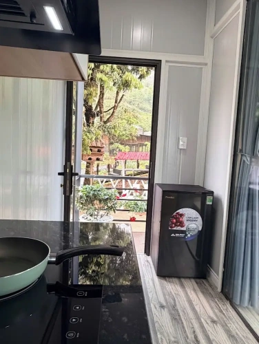 Standard Quadruple Family room with garden view