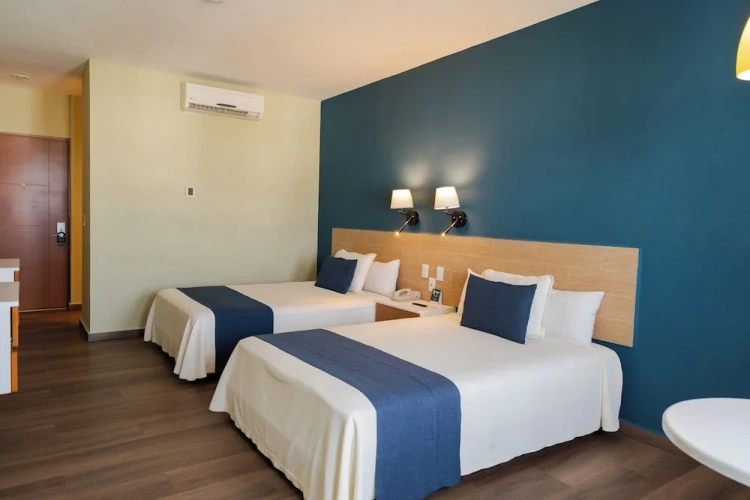 Standard Quadruple room with balcony and with city view