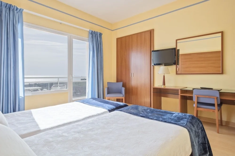 Standard Quadruple room with balcony and with sea view