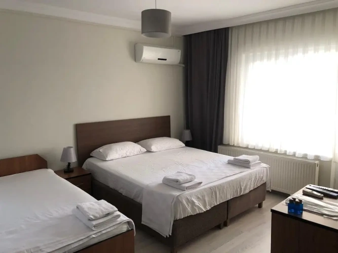 Standard Triple room with balcony and with city view