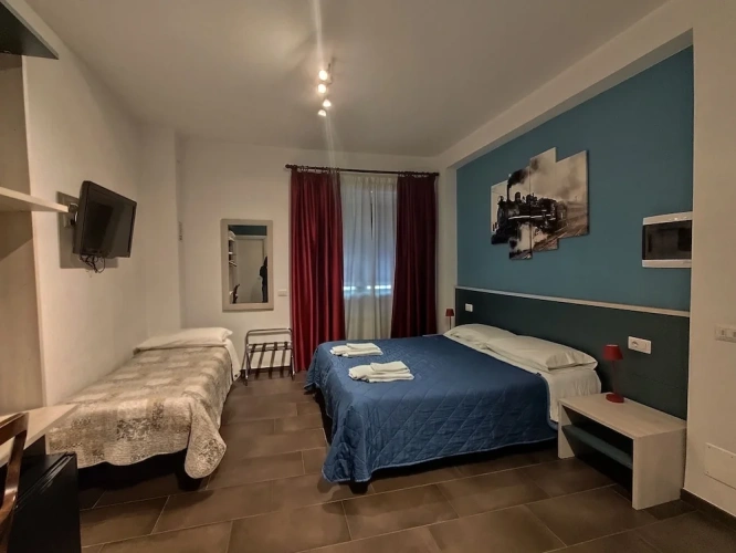 Luxury Triple room with balcony and with city view