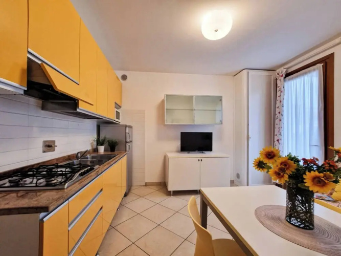 Colorful Apartment With Fenced Garden and Fireplace