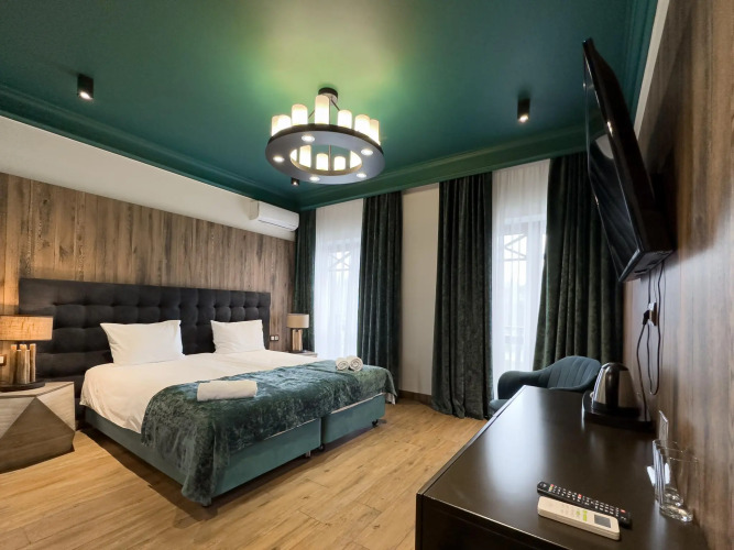 Фотография номера гостиницы За поводом