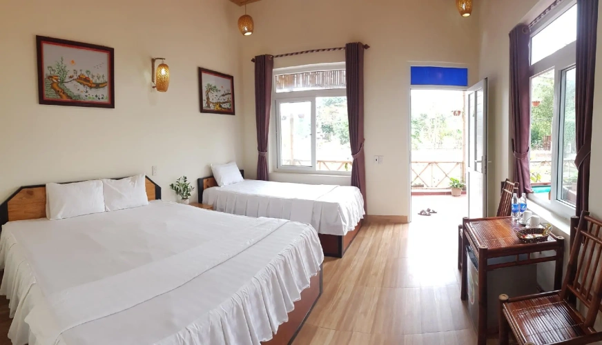 Standard Triple room with garden view