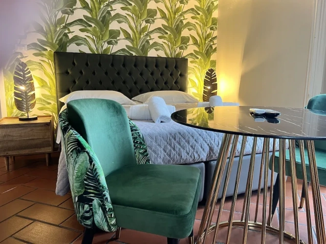 Deluxe Quadruple room with balcony