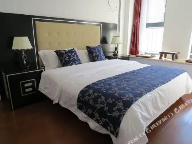 Guan County Hong Pu Traders Hotel