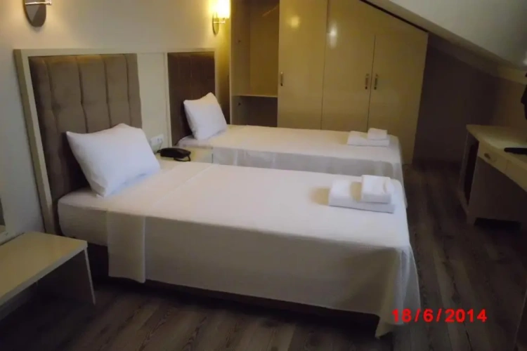 Deluxe Quadruple room with balcony