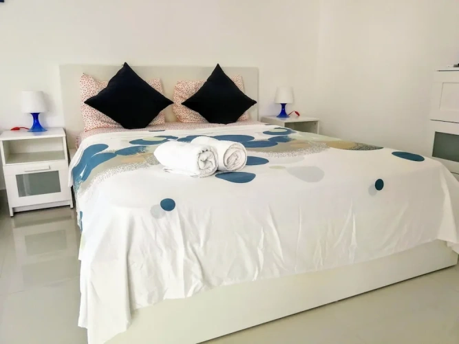 Deluxe Quadruple Suite with balcony and with pool view