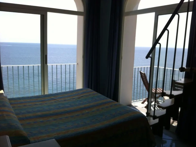 Standard Quadruple room with balcony and with sea view
