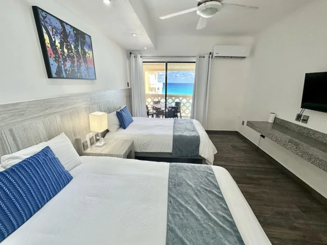 Superior Quadruple room with balcony and with ocean view