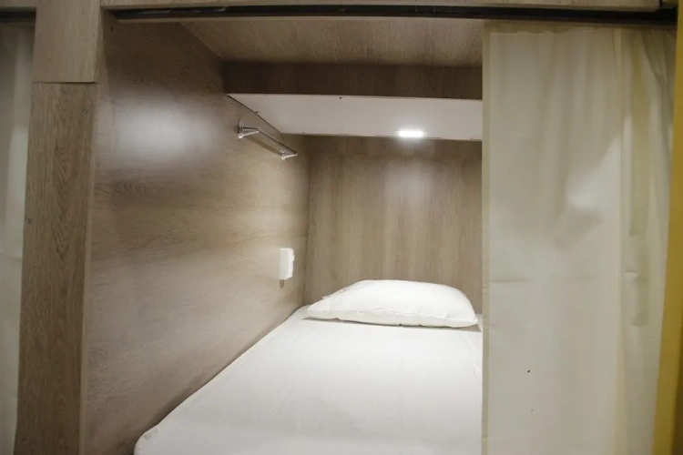 Bed in Dorm (female dorm) with balcony