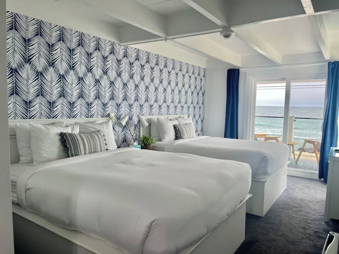 Deluxe Quadruple room with balcony and with ocean view
