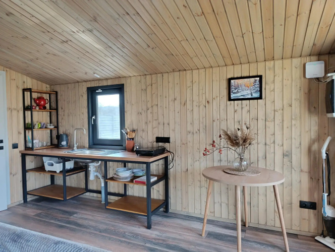 Фотография номера Коттеджа Дома в лесу возле реки