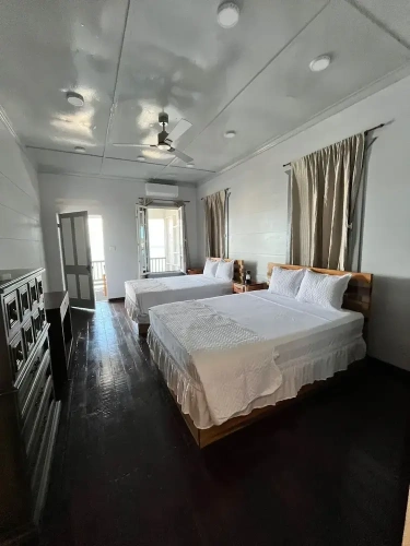 Deluxe Quadruple room with balcony and with sea view