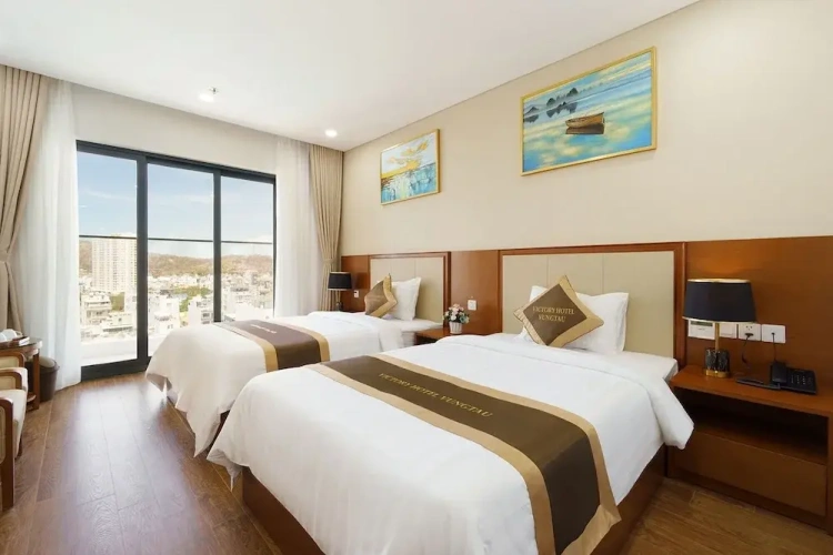 Deluxe Twin room with balcony and with partial ocean view
