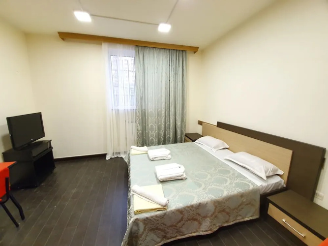 Doss Hostel And Hotel