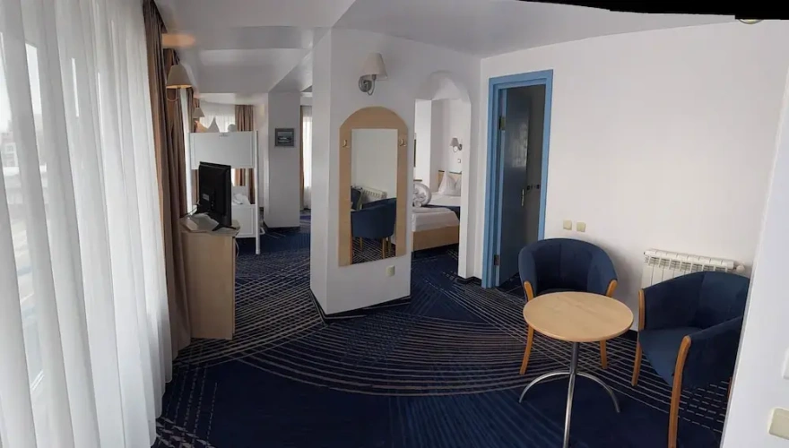 Standard Quadruple Family room with balcony and with partial sea view