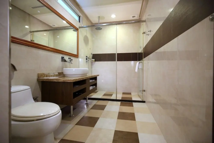 Standard Triple room with garden view