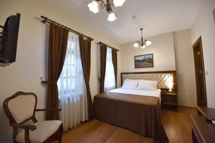 Standard Quadruple room with garden view