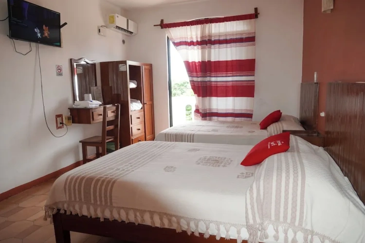 Deluxe Quadruple room with balcony and with city view