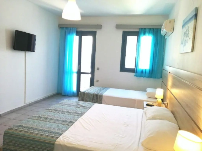 Superior Triple room with garden view