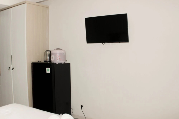 Homey And Cozy Studio Apartment At Elvis Tower