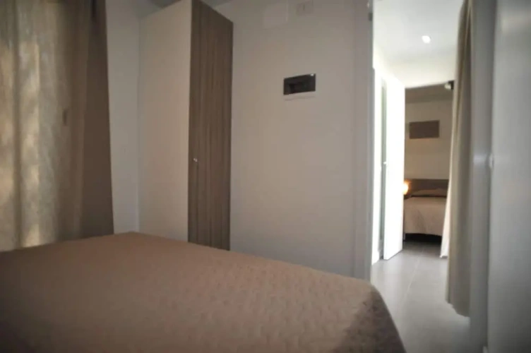 2 Bedrooms Standard Family room with partial ocean view