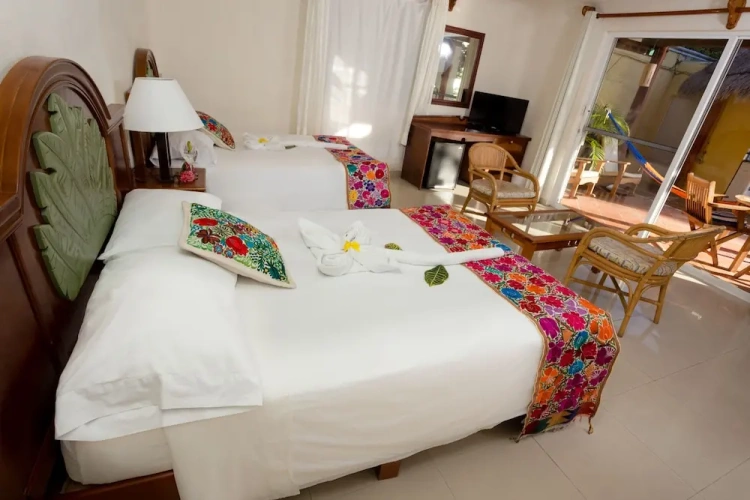 Standard Quadruple room with balcony and with garden view