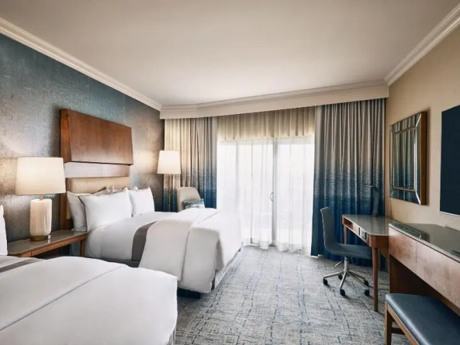 Deluxe Quadruple room with balcony and with golf view