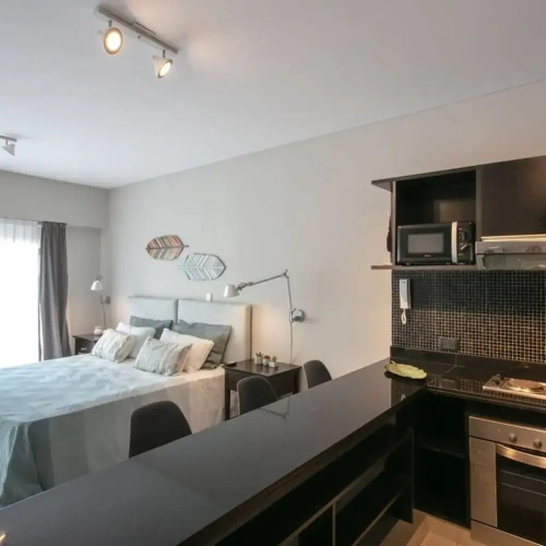 The Feather Comfortable Studio With Balcony