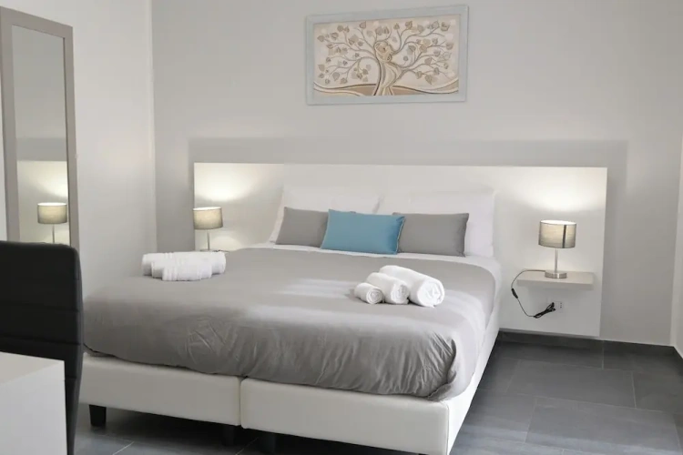 Comfort room with balcony and with city view