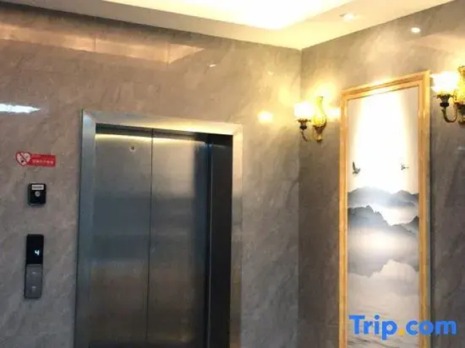 Pingle Xingfu Hotel
