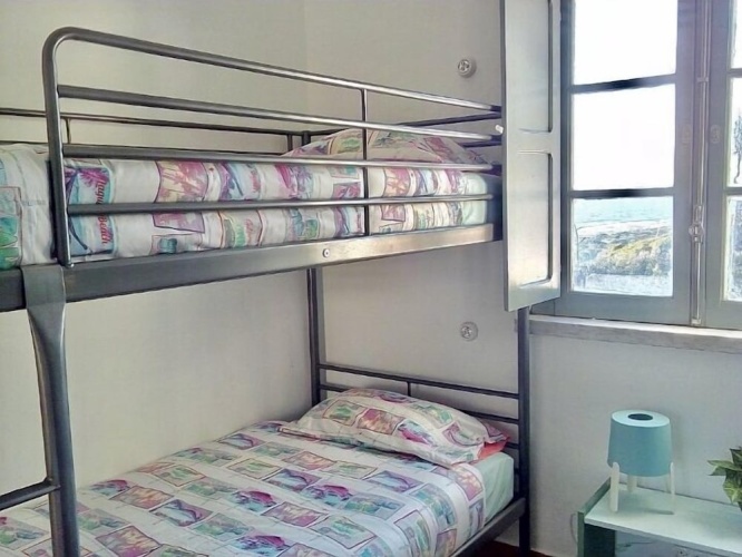 Bed in Dorm with balcony