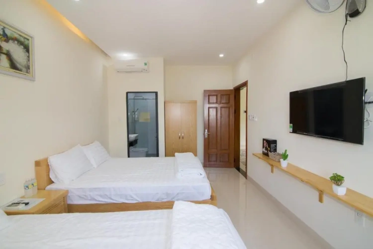 Standard Triple room with garden view